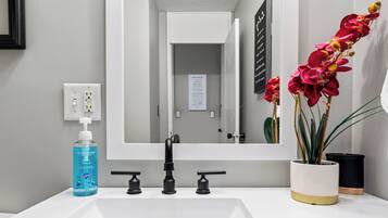 Hair dryer, towels, soap, shampoo