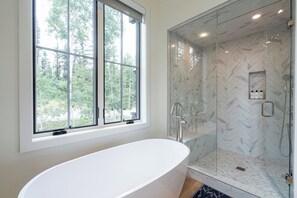 Bathtub, hair dryer, towels