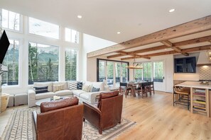 The Great room features a gas fireplace and opens to the dining and kitchen area.  Stunning views of the mountains outside.