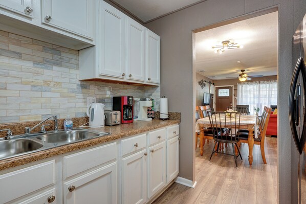 Fridge, microwave, stovetop, coffee/tea maker