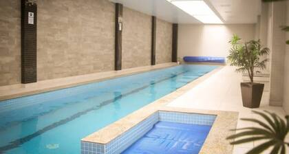 Studio Apartamento Clube Piscina Aquecida e Academia no Centro Curitiba MID Home