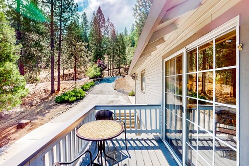 Secluded retreat with pool, nature views, patio, fireplace, & close to lake