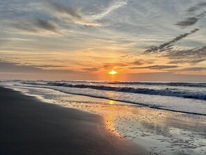 A beach with waves and a sunset. - Wake Up to the Sound of Waves (North Myrtle Beach)