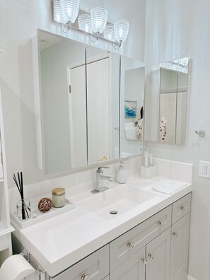 Hair dryer, towels, soap, shampoo