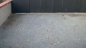 A gated area with a number 4908 on a dark wooden gate. - Stunning Ocean Beach Gem - has everything! (San Diego)