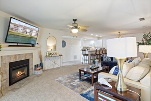 Smart TV, fireplace, books