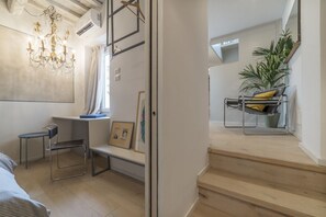 Interior - Exclusive loft located on the fourth and fifth floor of an ancient and characteristic building without a lift.In 75 square meters it comfortably accommodates 4 people with two bedroomsBreathtaking terrace overlooking the cityA few steps from the Imperial (Roma)