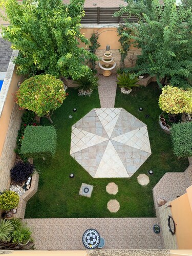 Suite Lujoso con Chimenea Patio y Garage Privado