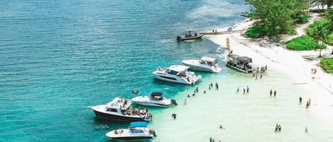 On the beach, sun loungers, beach towels
