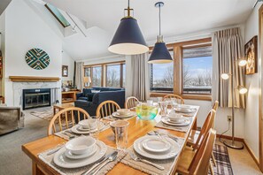 Open Dining Space Connected to Living Area - Seamless flow from dining to living room and kitchen makes gathering and entertaining effortless.