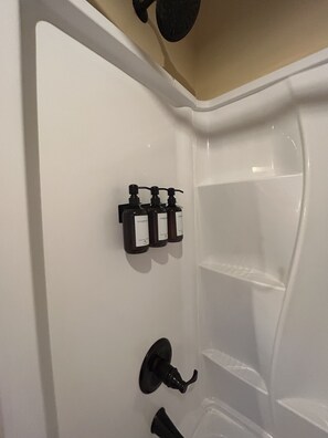 Hair dryer, towels, soap, shampoo