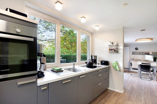 Ferienwohnung Im Eichholz" mit privater Terrasse, Gemeinschaftsgarten und WLAN