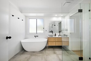 Shower, hair dryer, towels, soap