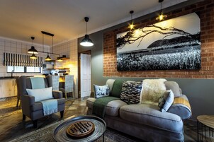 Deluxe Suite | Living area | Smart TV, Netflix, streaming services