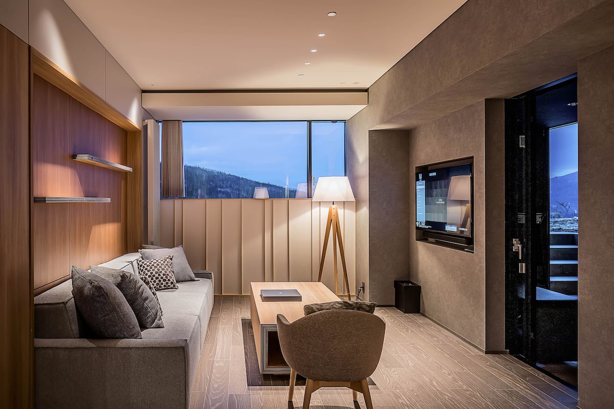 Signature King Suite Ski in / out, Non Smoking | Living area | 43-inch Smart TV with digital channels, toys, heated floors