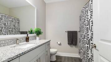 Bathtub, free toiletries, hair dryer, towels