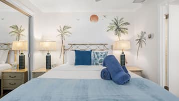 1 bedroom, desk, iron/ironing board, travel crib