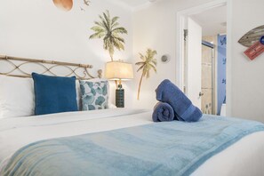 1 bedroom, desk, iron/ironing board, travel crib