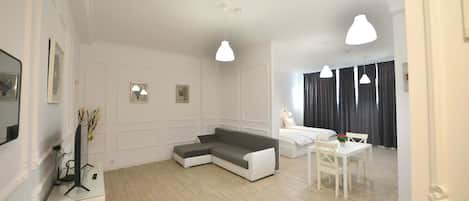 Superior Apartment | Living area | Flat-screen TV