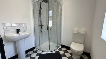 Shower, free toiletries, towels, soap