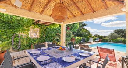 Own house on a 3 villa property with shared pool.