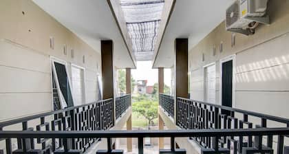 SPOT ON 92797 Awi Stay Syariah Near SIMPANG KAWASAN INDUSTRI WILMAR PELINTUNG