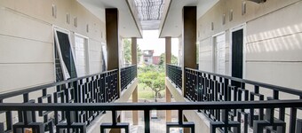 SPOT ON 92797 Awi Stay Syariah Near SIMPANG KAWASAN INDUSTRI WILMAR PELINTUNG