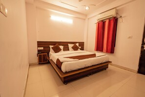 Deluxe Room | Desk, laptop workspace, free WiFi, bed sheets - Orchid Hotel and Hostel (Narendranagar)