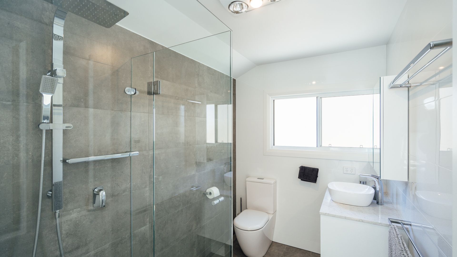Shower, towels, shampoo, toilet paper