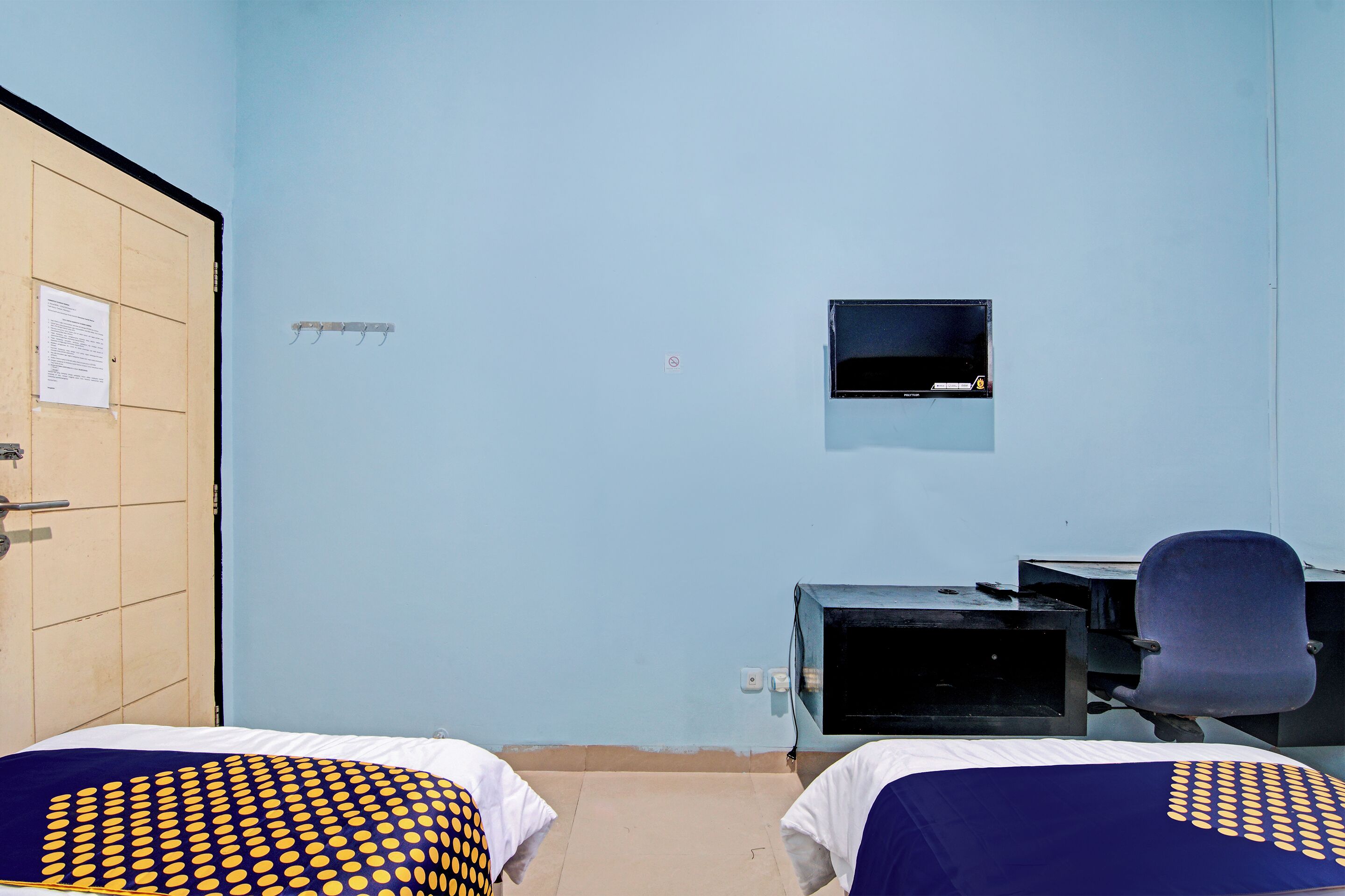 Foto - Hotel O Penginapan Puti SyariahNearBandara Sultan Syarif Kasim II