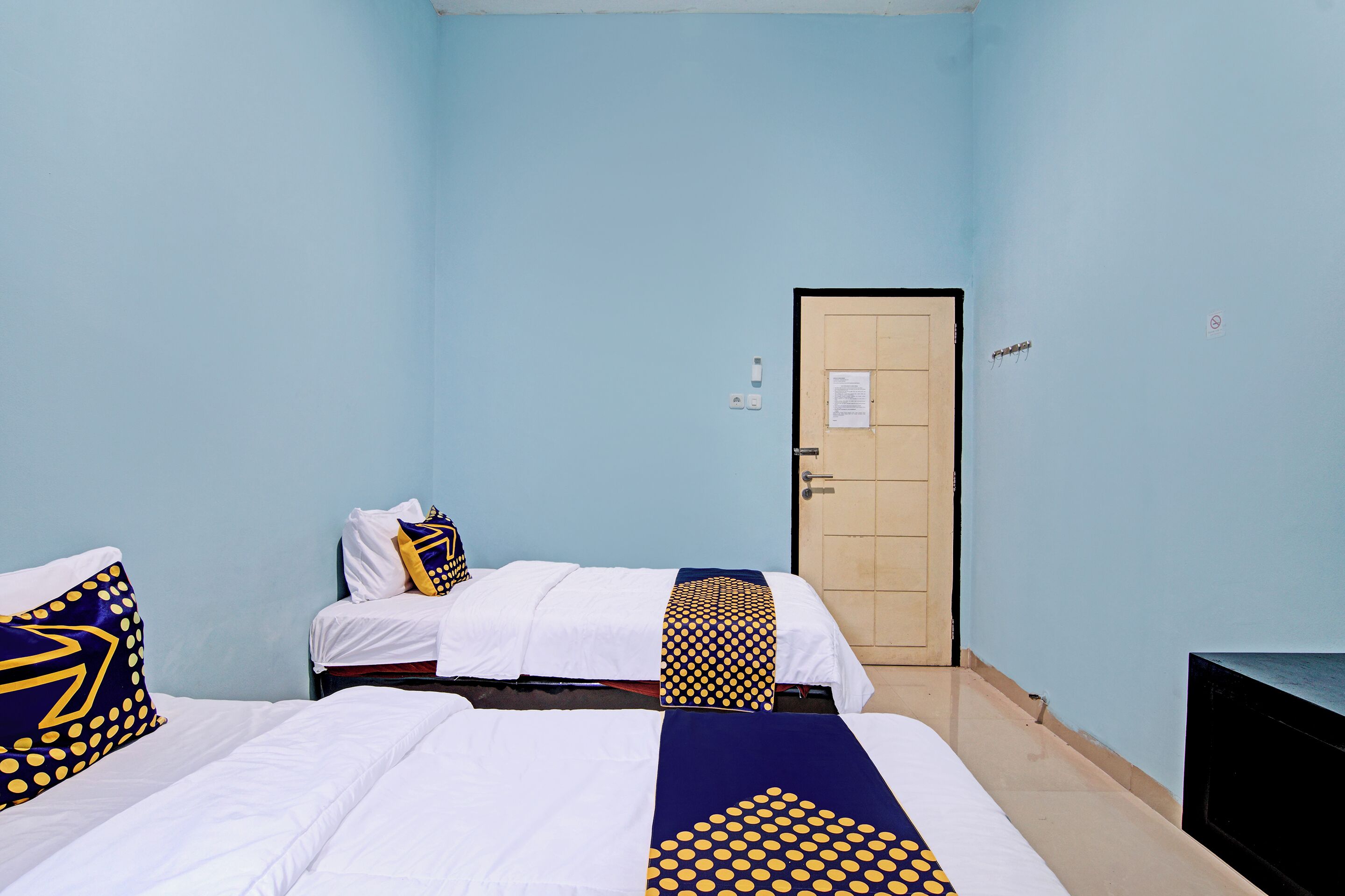 Foto - Hotel O Penginapan Puti SyariahNearBandara Sultan Syarif Kasim II