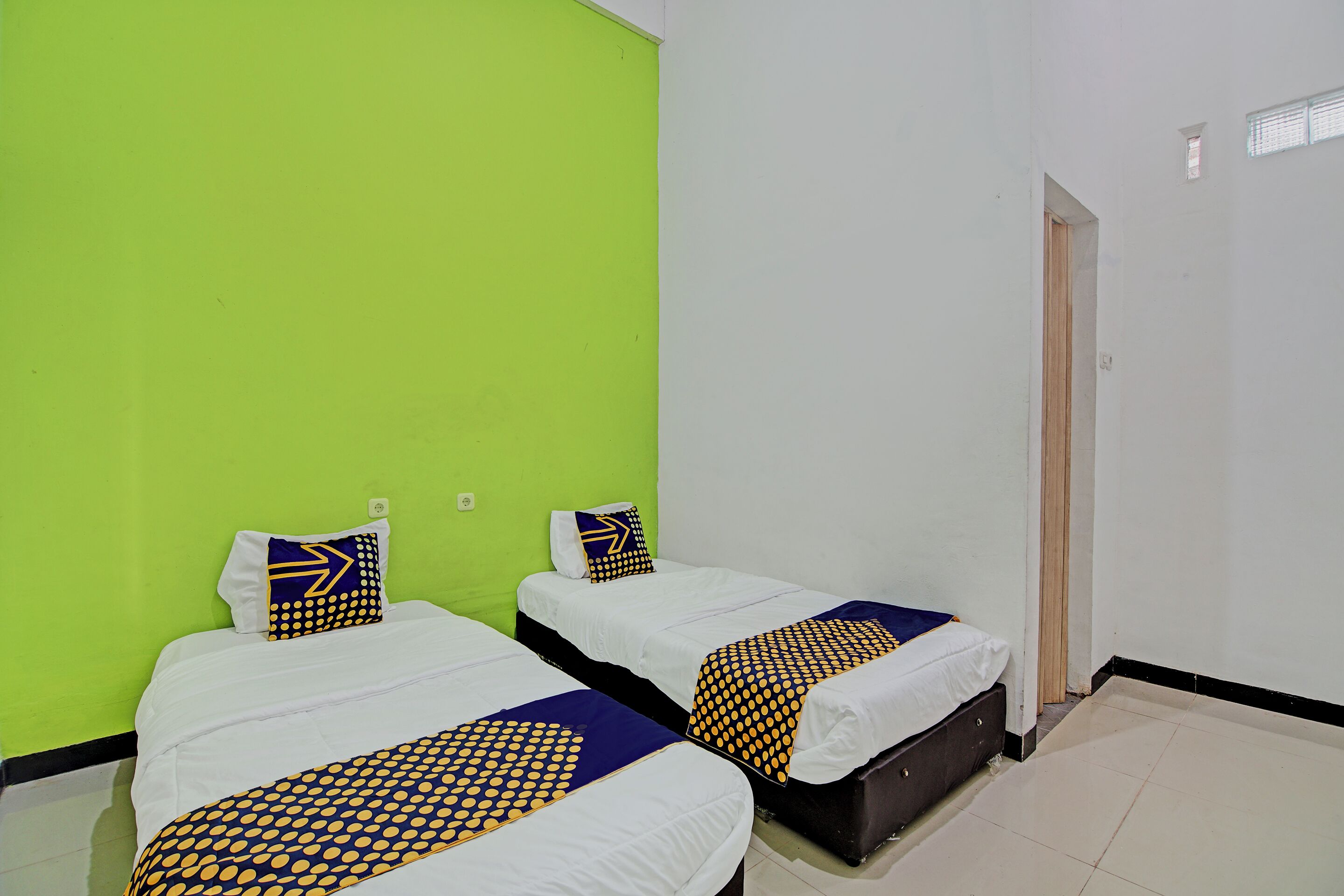 Foto - Hotel O Penginapan Puti SyariahNearBandara Sultan Syarif Kasim II