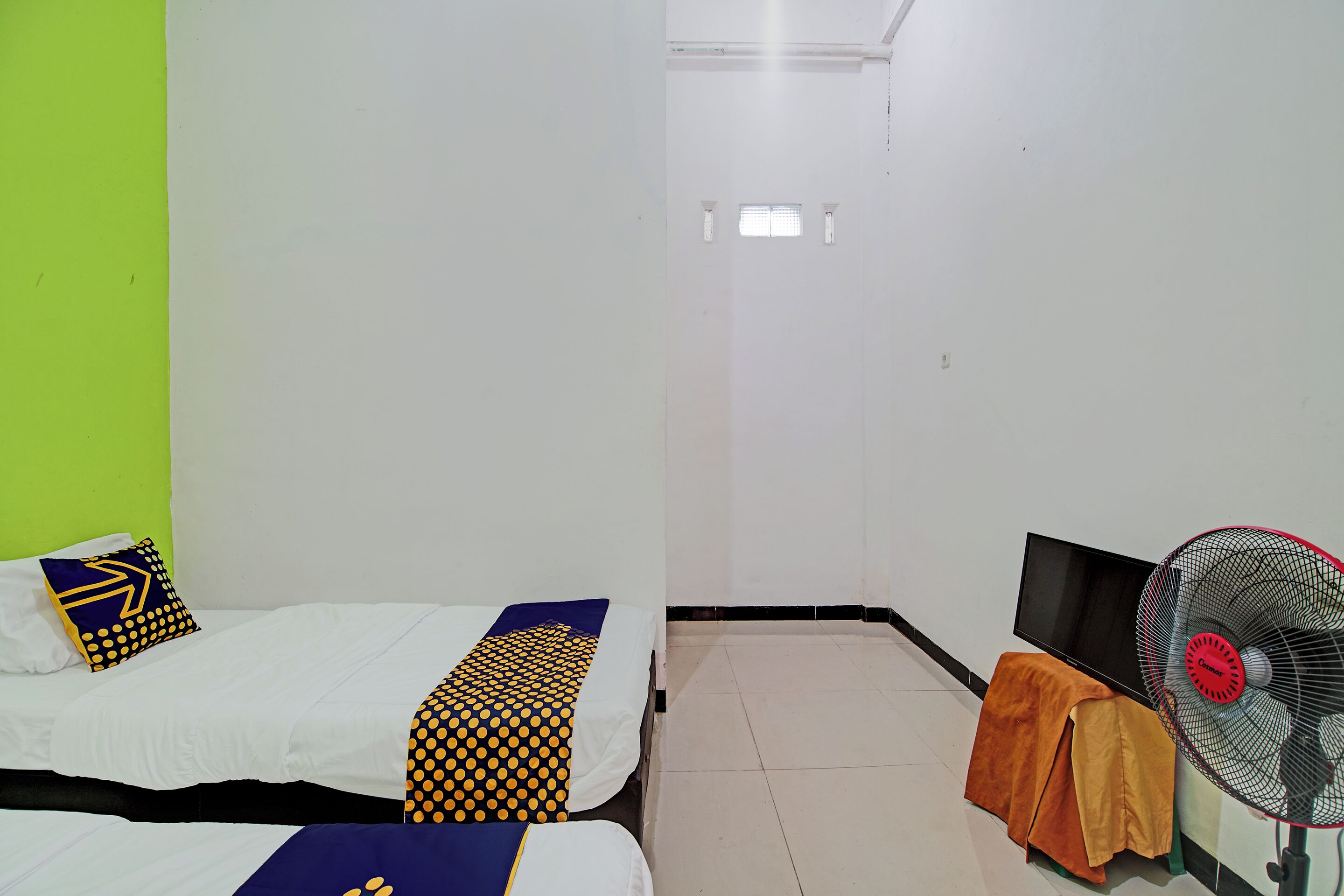 Foto - Hotel O Penginapan Puti SyariahNearBandara Sultan Syarif Kasim II