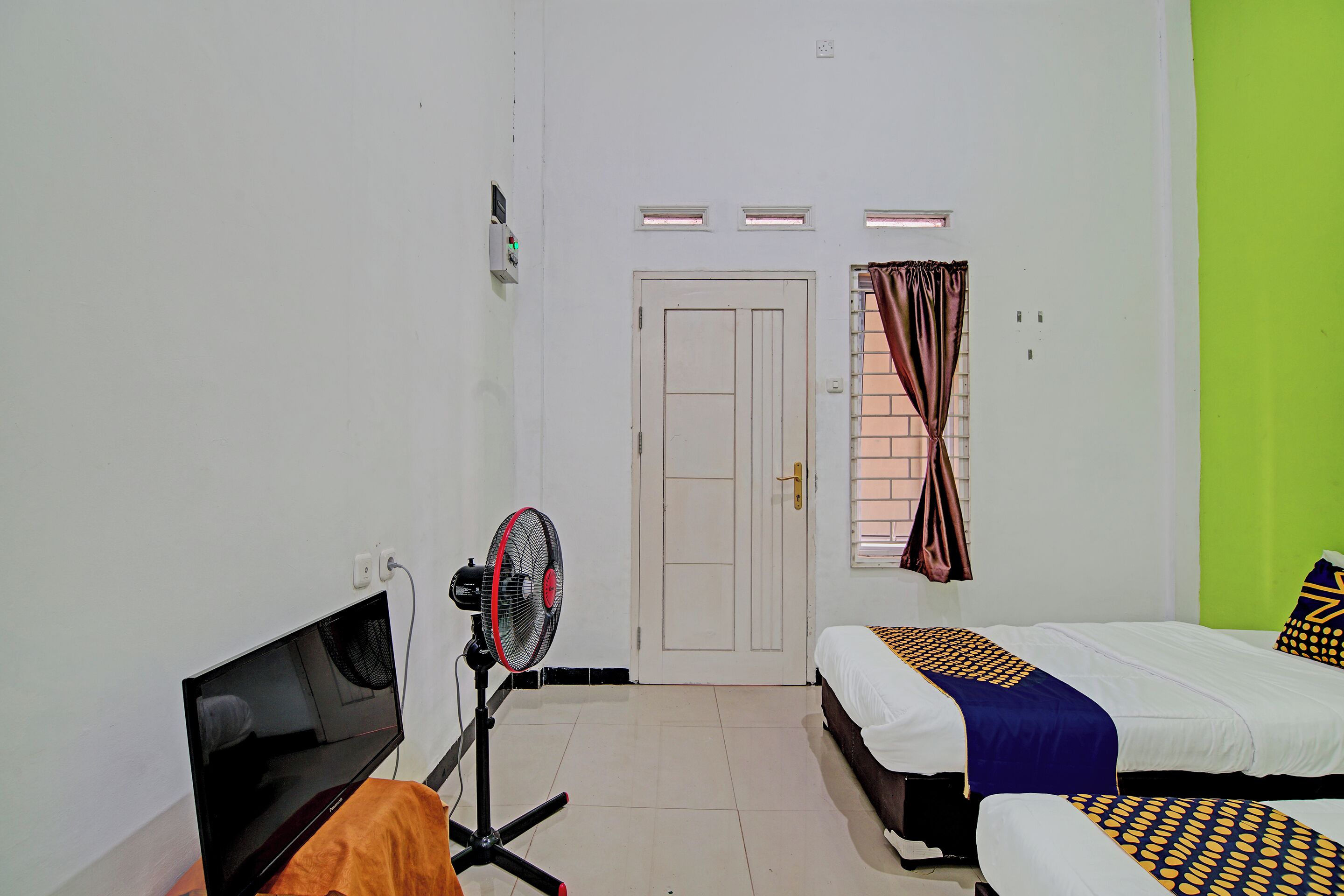 Foto - Hotel O Penginapan Puti SyariahNearBandara Sultan Syarif Kasim II