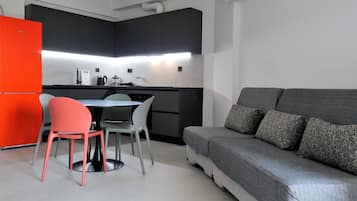 Appartement Confort, balcon, vue ville | Coin séjour