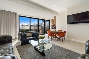 TV - Sanlor Suite 2 | Luxury, Comfort & Style (Orange)