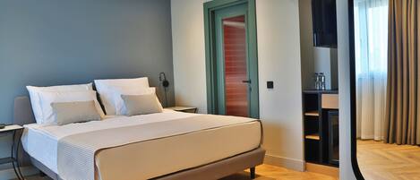 Premium bedding, minibar, in-room safe, desk