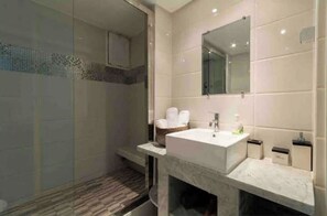 Hair dryer, towels, soap, shampoo
