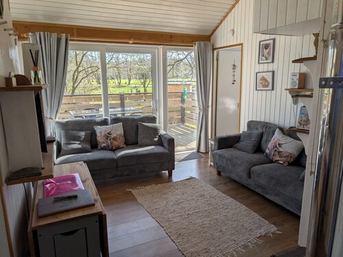 Cruachan is a charming cabin, in peaceful, woodland location by babbling burn.