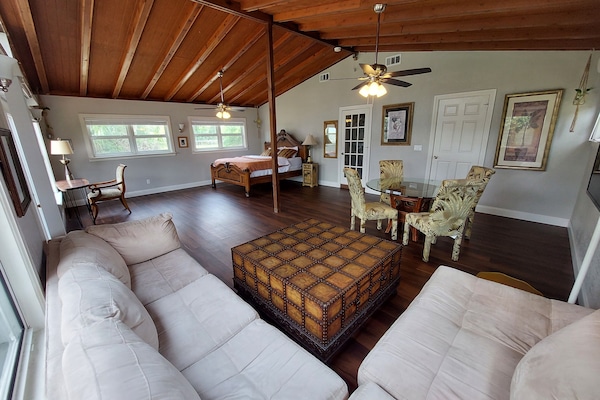 Loft space with corner sofa (hidden guest bed inside sofa)