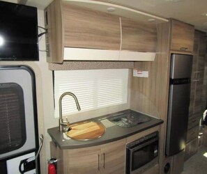 Fridge, microwave, oven, stovetop - Glamping with Elegant RV Rentals! (Gainesville)