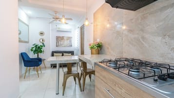 Family Apartment | Private kitchen | Griddle, cleaning supplies