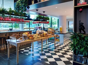 Daily buffet breakfast (USD 20 per person)