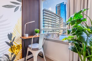 Apartment | Living area | 55-inch Smart TV with cable channels, Netflix, streaming services - Resort Experience in Puerto Madero (Buenos Aires)