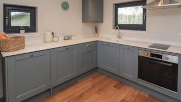 Fridge, electric kettle, toaster, cookware/dishes/utensils