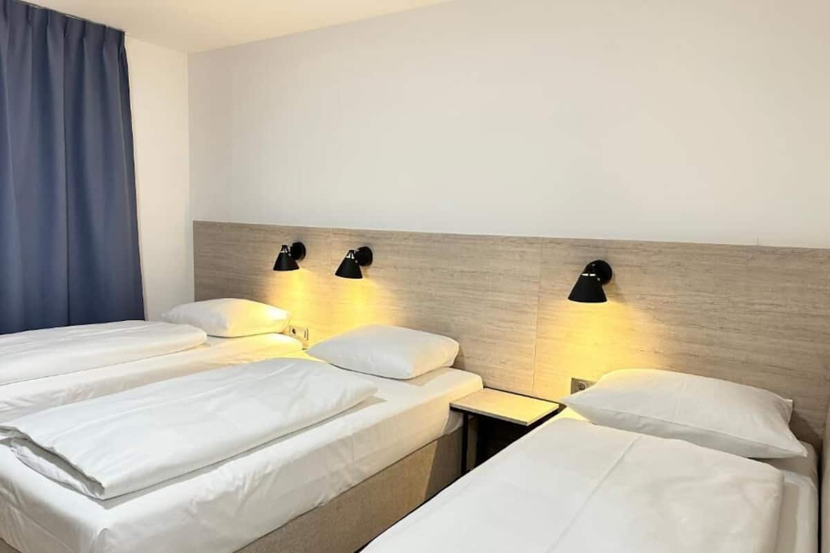 1 habitación, insonorización, wifi gratis y ropa de cama