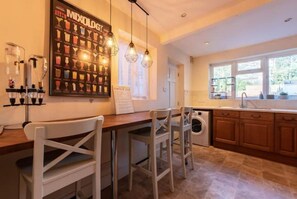 Enjoy cooking and socializing in this kitchen with a central island and bar seating.