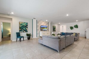 Living area - Spacious Family Reunion 15br Home Pool Spa Game Rm (Kissimmee)