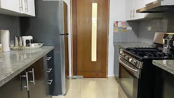 Fridge, microwave, oven, stovetop