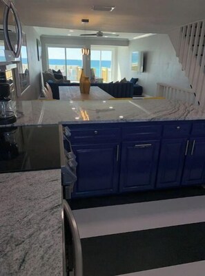 Enjoy meals in the kitchen with a large window offering a view of the outdoors.